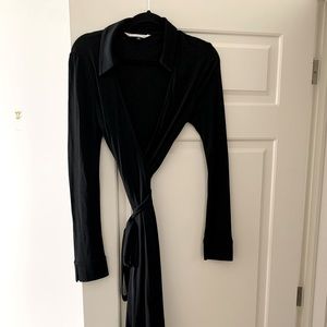 Diane Von Furstenberg iconic black wrap dress in black.